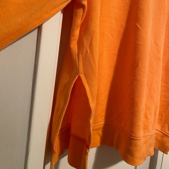 Long sleeve slitted top. - Picture 2 of 3